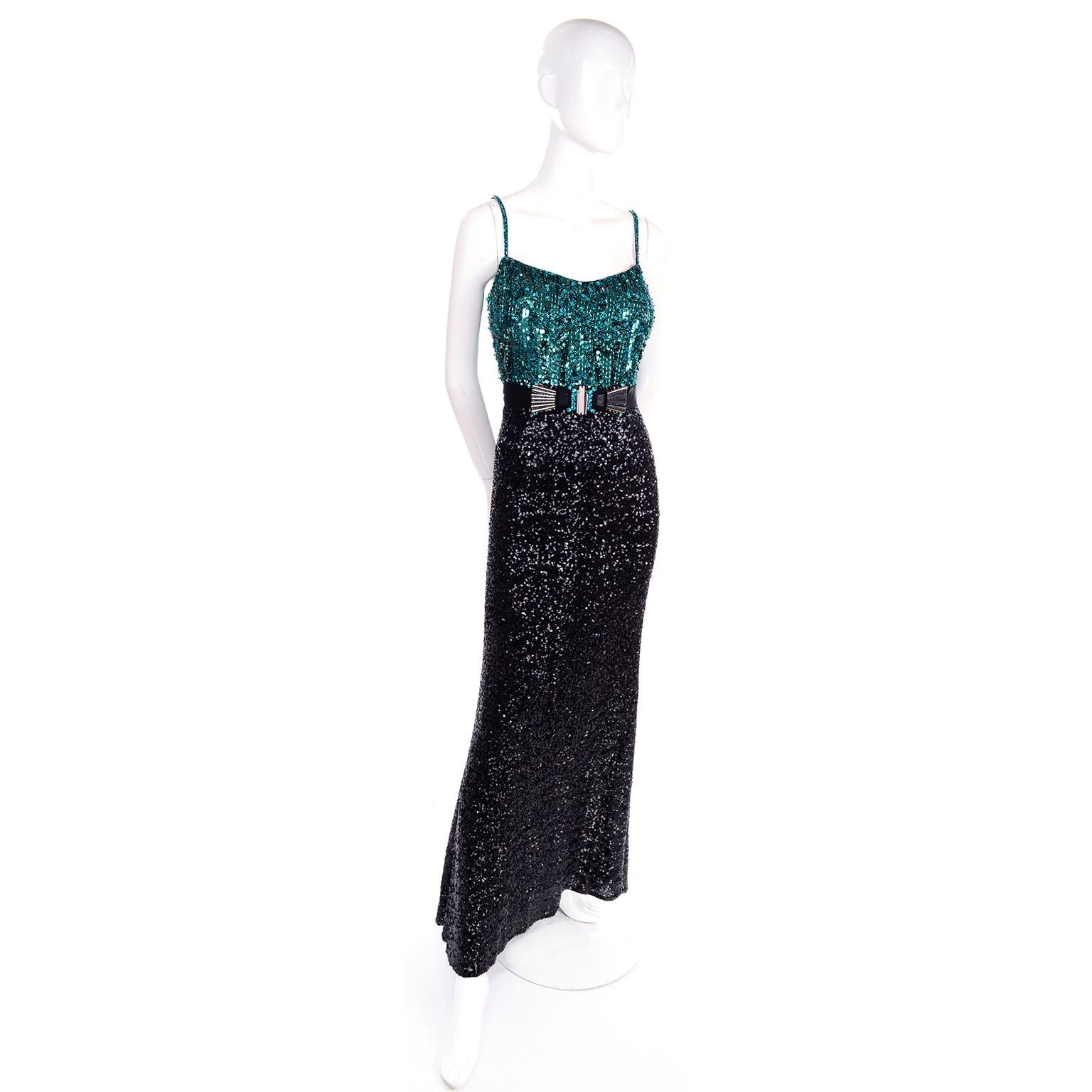 This vintage 1990s Badgley Mischka dress is so stunning in person! This luxe green beaded dress has spaghetti straps, beads, sequins and a black lower portion that has a slight stretch to it and is covered in tiny stacked sequins. We love the Art