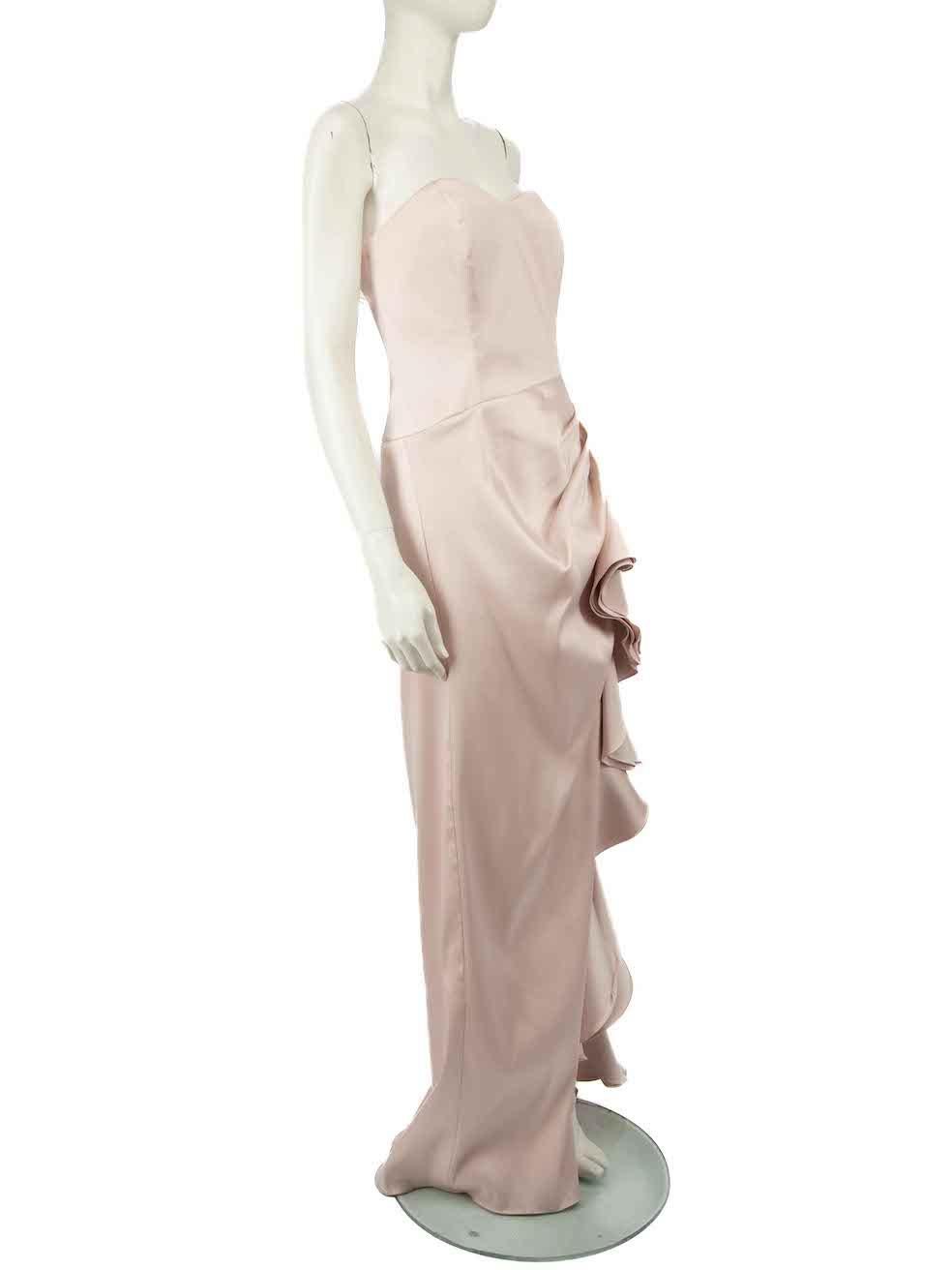 CONDITION is Very good. Minimal wear to dress is evident. Minimal fraying along hem and discolouration on the back and hem on this used Badgley Mischka designer resale item.
 
 
 
 Details
 
 
 Pink
 
 Polyester
 
 Gown
 
 Strapless
 
 Ruffle hem
 
