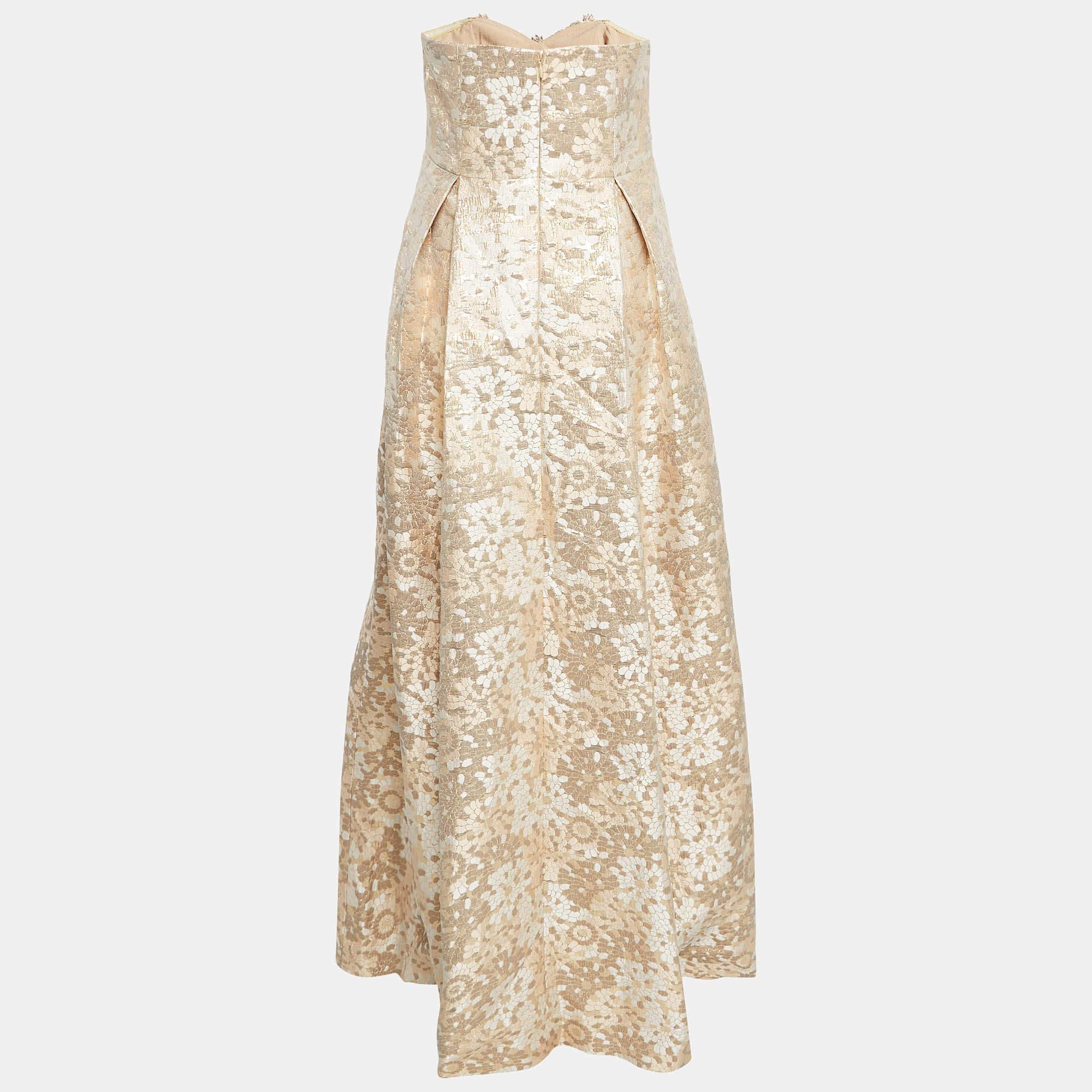 Resplendent elegant and gorgeous this gown defines it all. Flaunting a floor length silhouette this gown is beautified using stunning details and a stylish neckline. Wear it with statement accessories and a defining clutch.