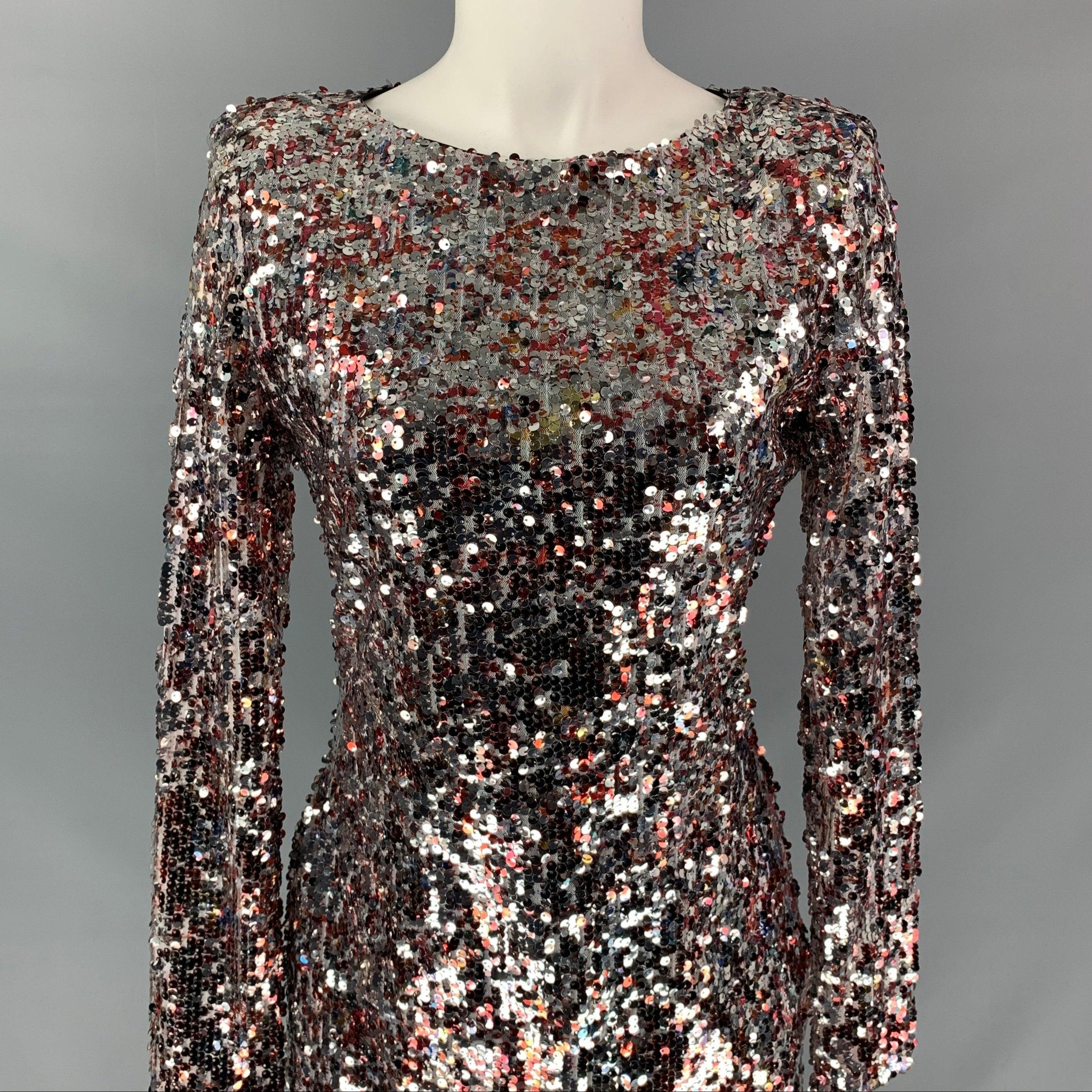 MARK + JAMES by
BADGLEY MISCHKA dress in a silver & burgundy sequined fabric featuring a mini style, a-line, long sleeves, and a back zipper closure.
Very Good
Pre-Owned Condition. 

Marked:   M 

Measurements: 
 
Shoulder: 15 inches  Bust:
34