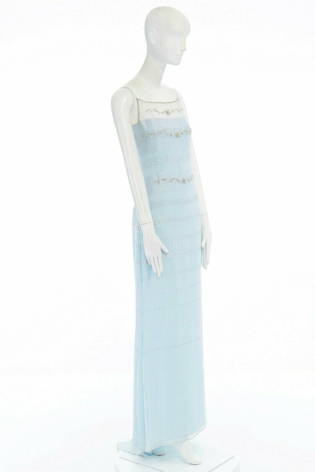 BADGLEY MISCHKA sky blue silk bead embellished embroidered gown dress UK10 
Reference: LACG/A00213 
Brand: Badgley Mischka 
Designer: Badgley Mischka 
Color: Blue 
Closure: Zip 
Extra Detail: 100% silk. Light blue. Spaghetti strap. White mesh