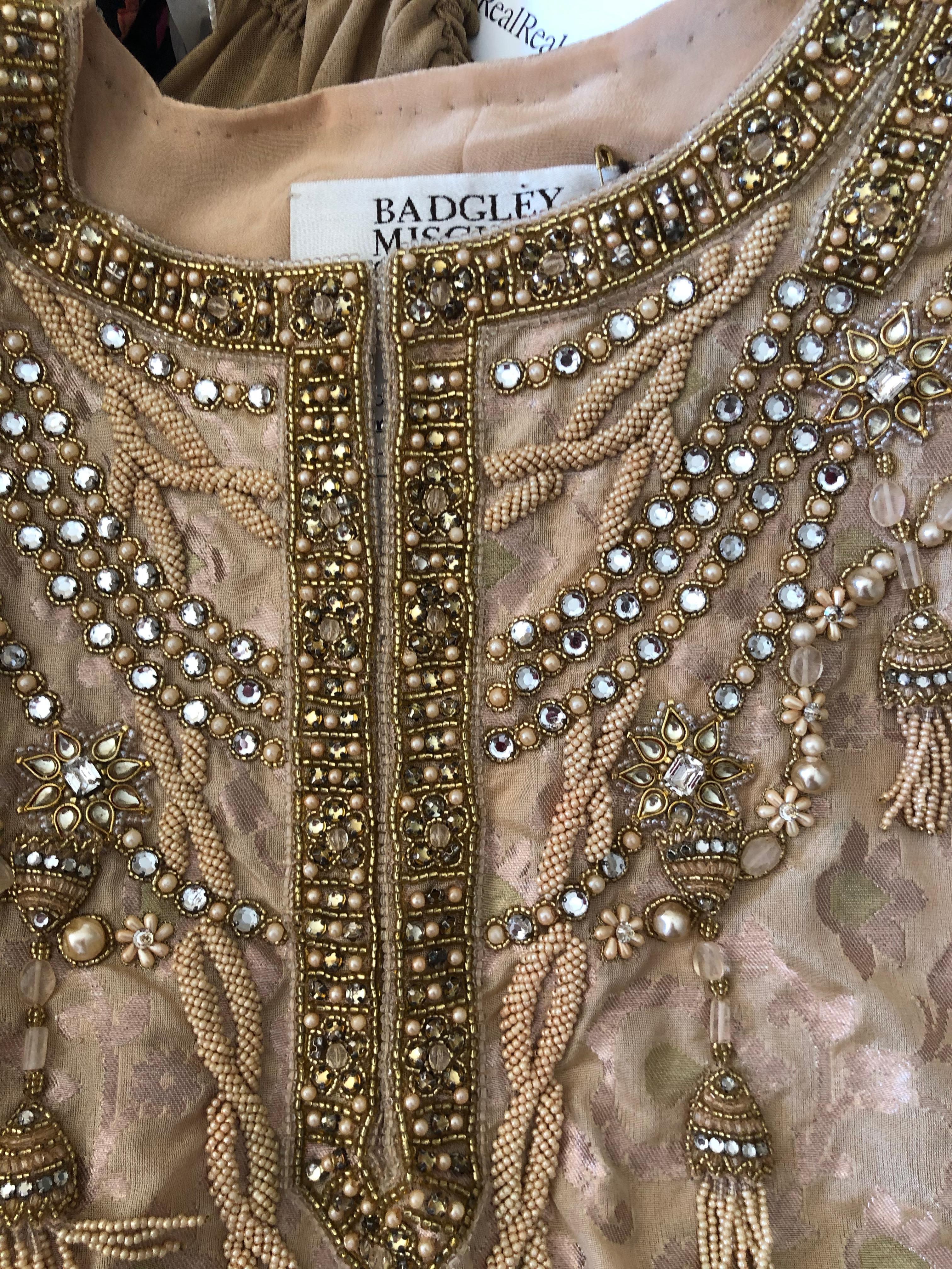 Badgley Mishka Couture Richly Jeweled & Pearl Embellished Gold Silk Caftan
Unworn with store tags
One Size
Bust 44