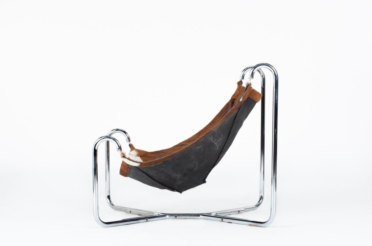 Baffo armchair 1st edition by Gianni Pareschi and Ezio Didone in 1969, for Busnelli.
Tubular chrome structure with a cowhide seat fixed.