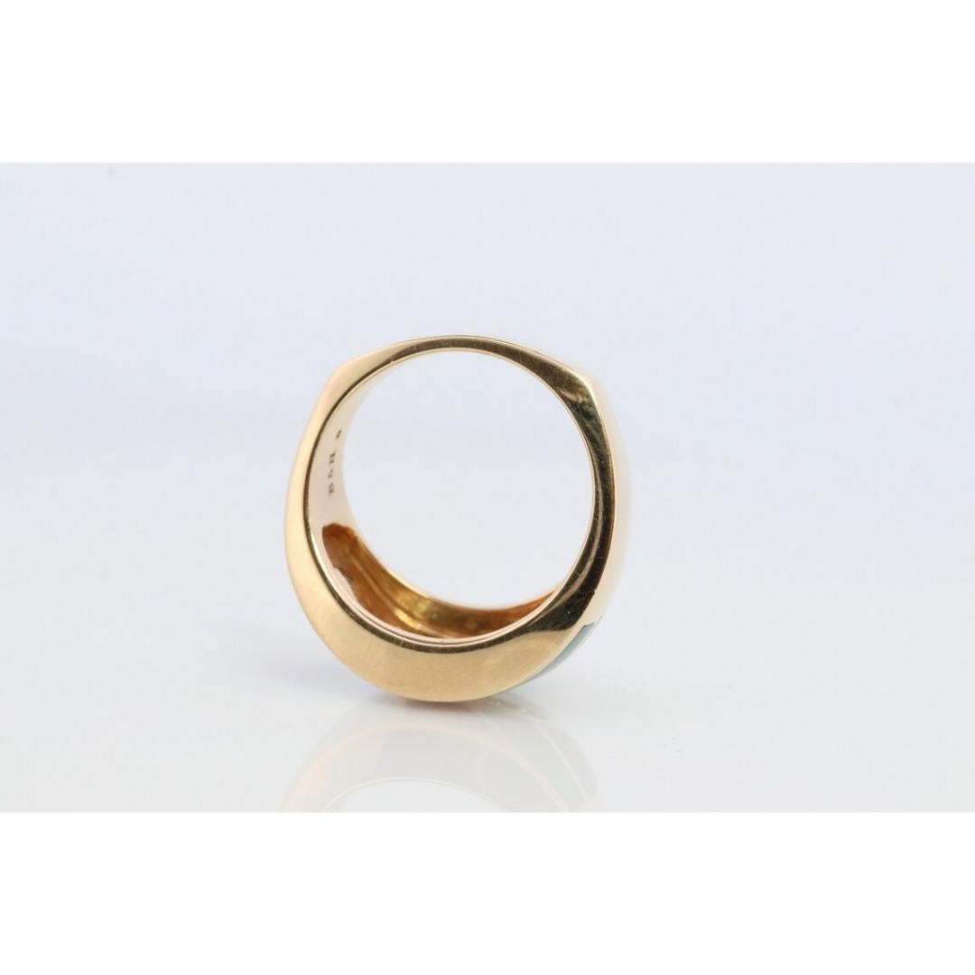 Vintage from before 2000
Size: 6 1/2 US
Materials: Stone

Gemstone: Turquoise

Stunning Bagley and Hotchkiss 14K Yellow Gold Inlaid Gemstone RING.

Condition: Shows little to no signs of wear.

Details:
9.5grams
11.5mm wide and 5mm rise
1.5mm to 3mm