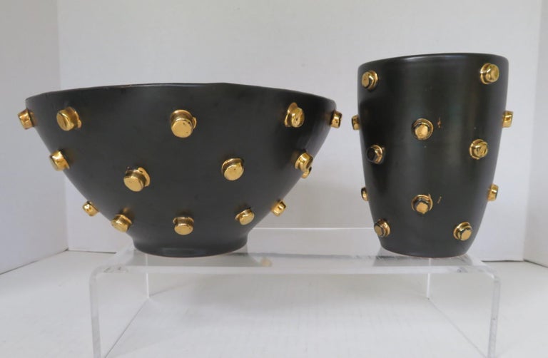 An outstanding pair of Italian Modern Pottery vessels from Bitossi of Italy by Good Friends Imports. Good Friends would have designs made to order from the Bitossi factory which made their wares more unsual and sought after. Artistic ceramic vase