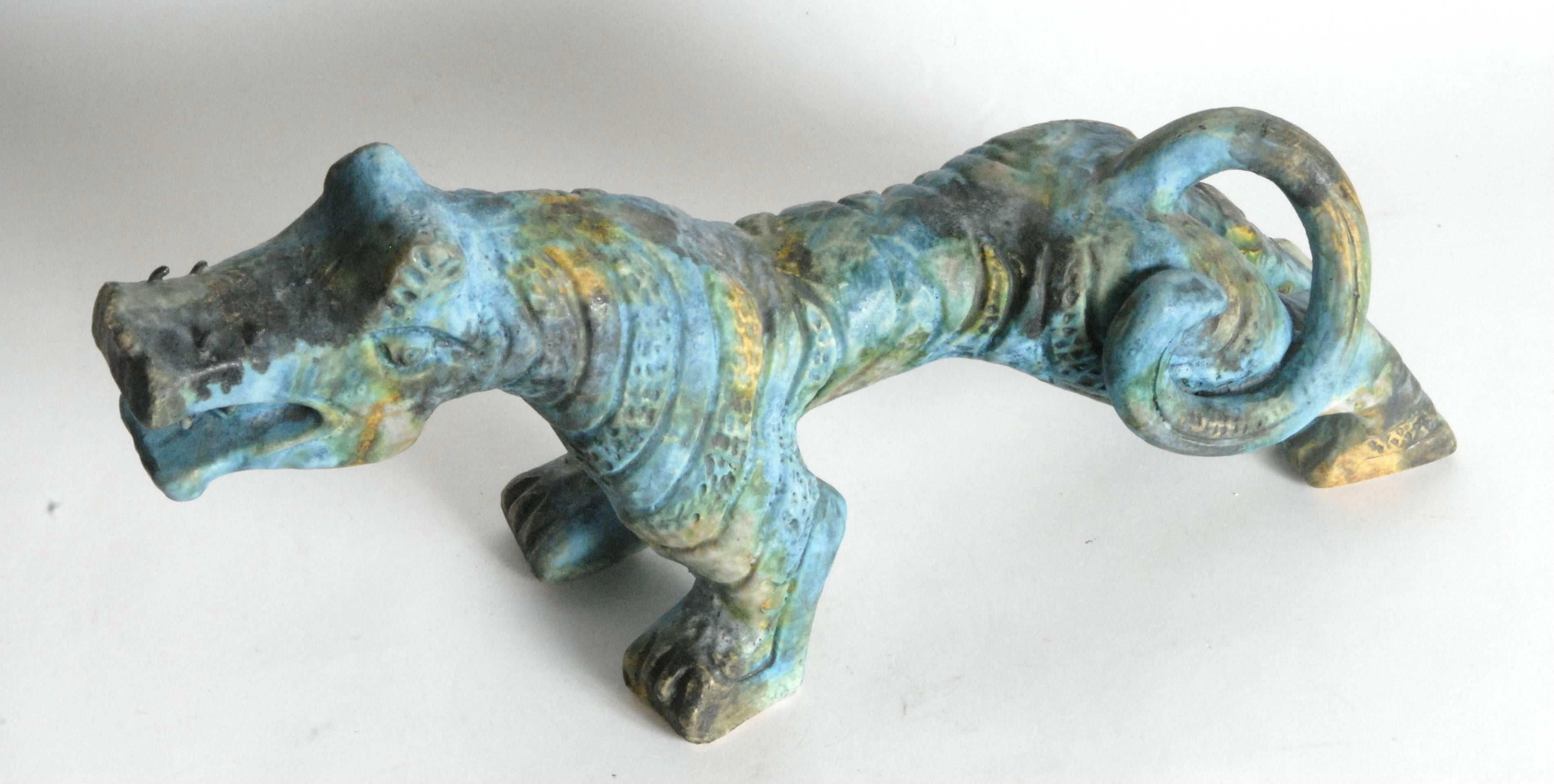 Designed by Alvino Bagni for his own factory, Bagni Ceramiche, the 'Sea Garden' glaze was developed in 1960. This large tiger has a beautiful graduation of colors throughout its long body suggesting an early production as later versions missed out