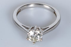 Bague alliance solitaire - or blanc 18 carats