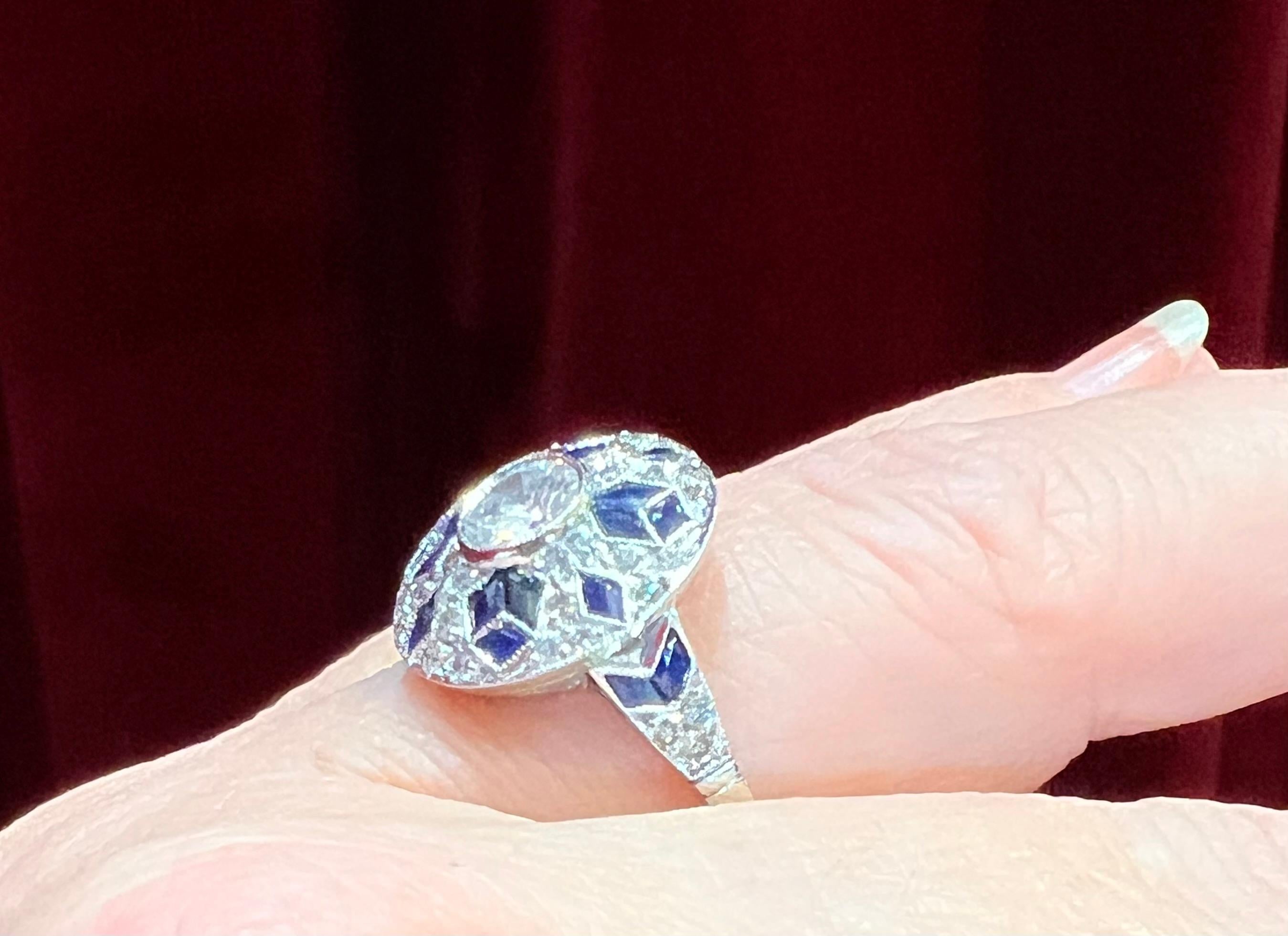 Women's Art deco ring, in platinum set with diamonds and sapphires For Sale