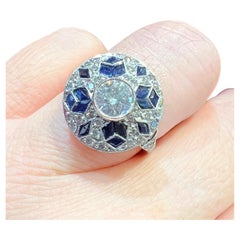Anello Art déco, in platino con diamanti e zaffiri incastonati