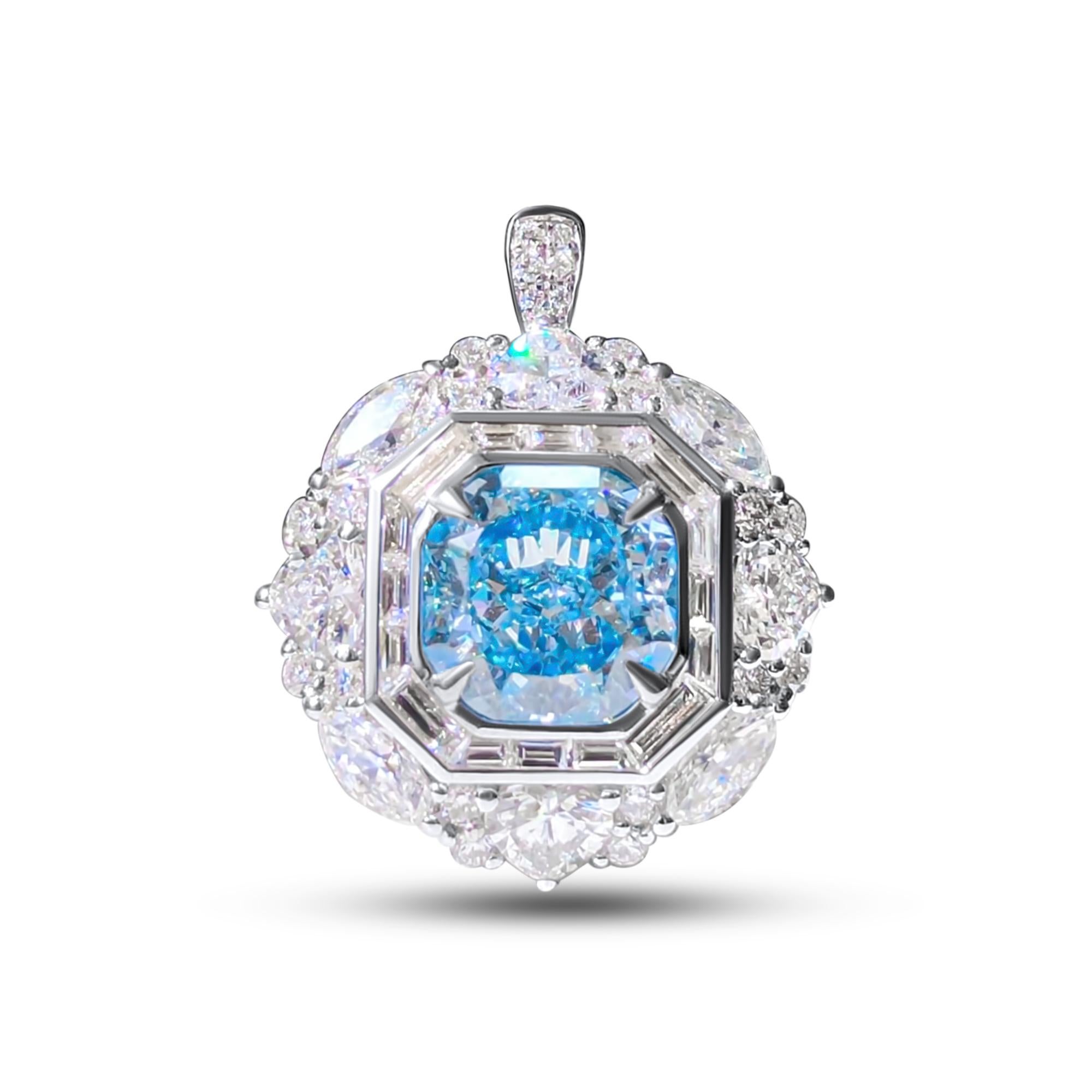We invite you to discover this majestic pendant ring set with a 2.29-carat GIA-certified cushion-cut blue diamond accented with a baguette-cut white diamond halo, its heart-cut side diamonds add a romantic charm to this charming jewel. 

New ring