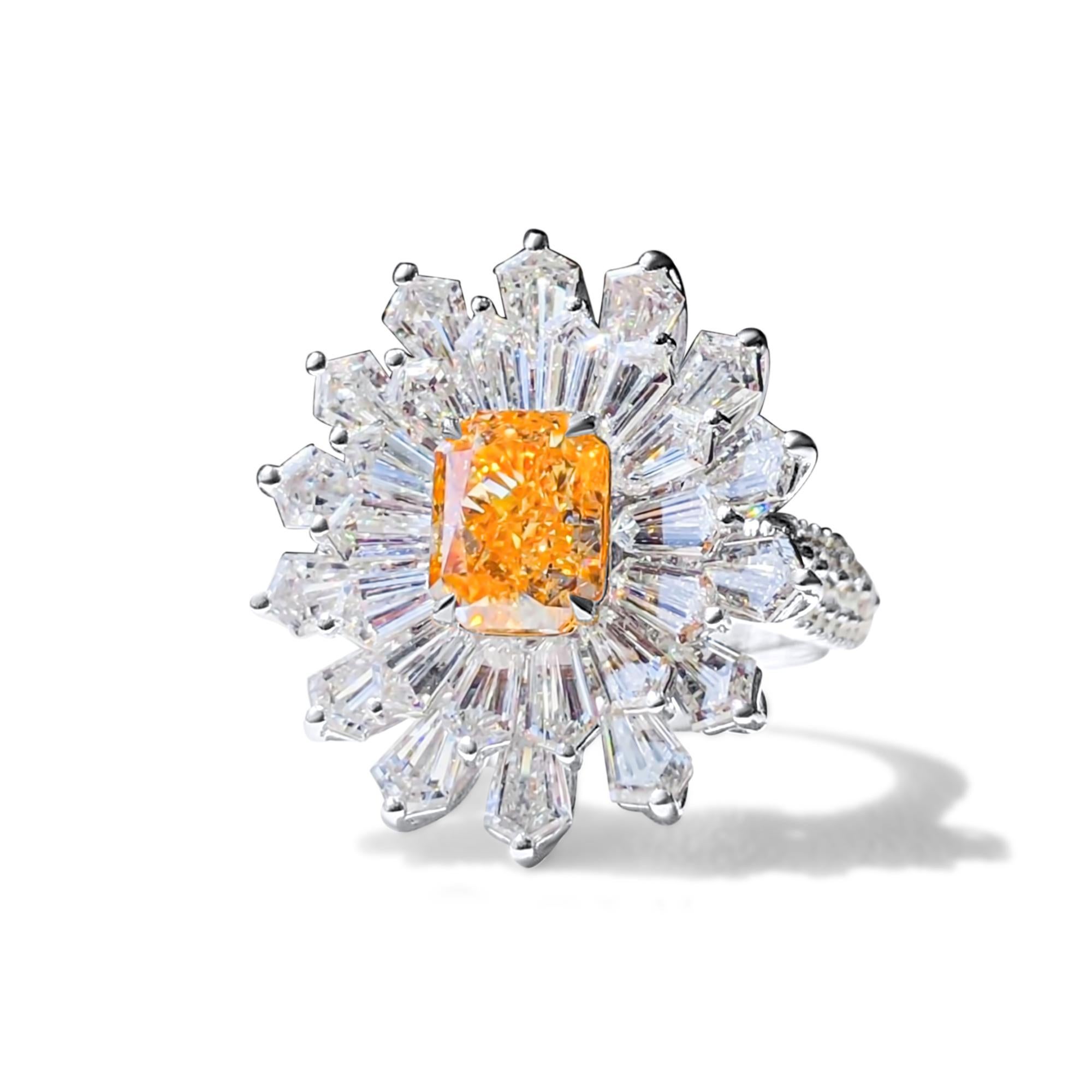 Wir laden Sie ein, diesen charmanten Ring mit einem 2,02 Karat GIA-zertifizierten orangefarbenen Diamanten zu entdecken, der mit farblosen Baguette-Diamanten von insgesamt 3 Karat besetzt ist. Vielseitig, auch als prächtiger Anhänger zu tragen