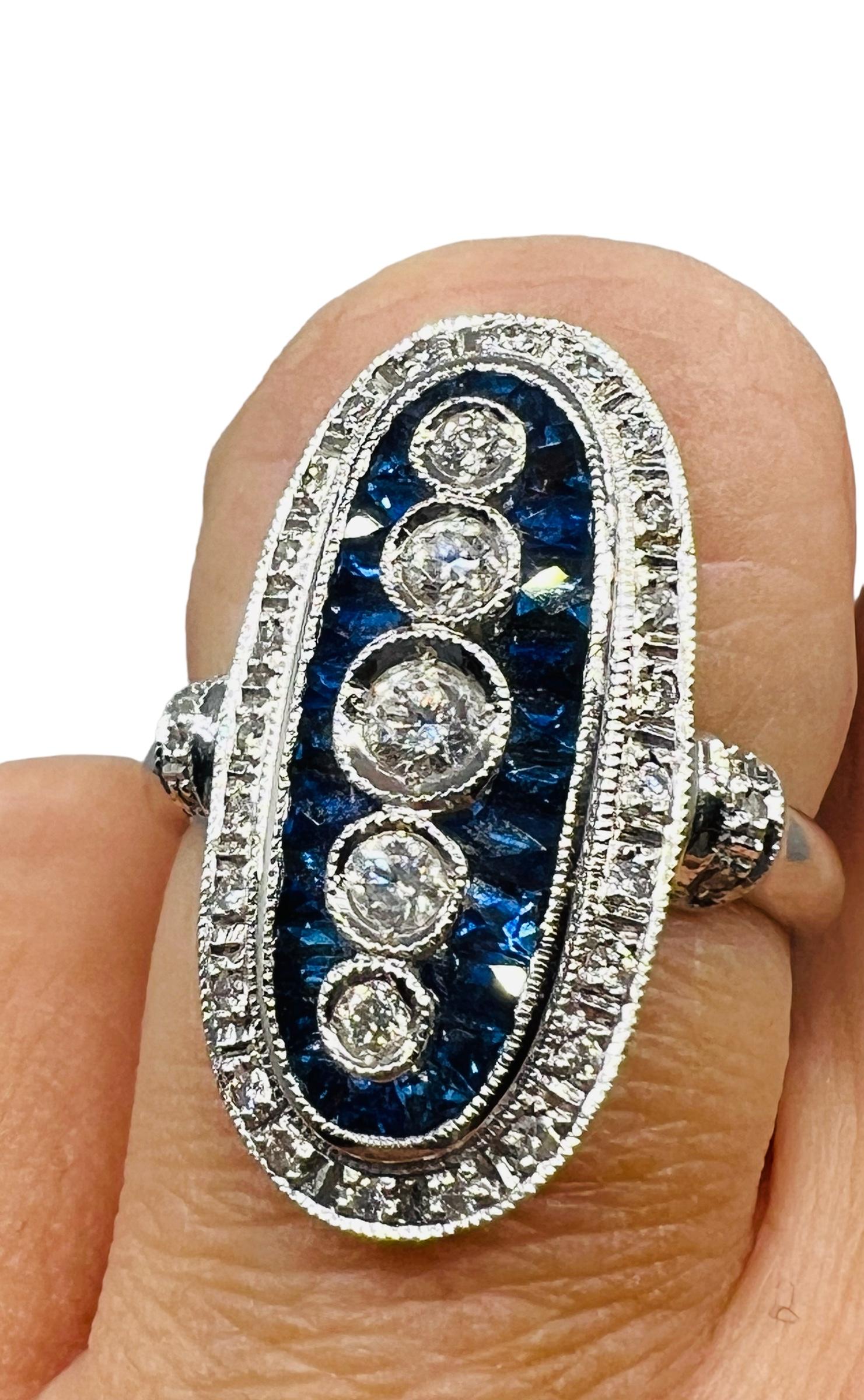 18-carat white gold cocktail ring set with sapphires and diamonds 2