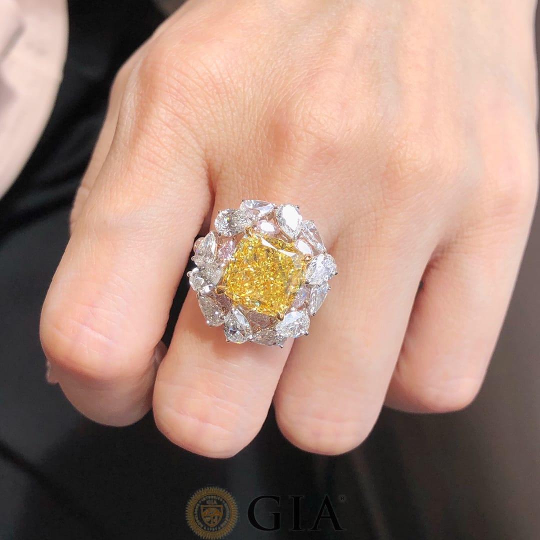 Art Deco 7.01 Carat Intense Yellow Cushion Cut Diamond Ring GIA Certified For Sale