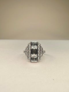 Art Deco Style 18k White Gold 0.70 Ct Emerald Cut Diamond Ring and 4 baguettes