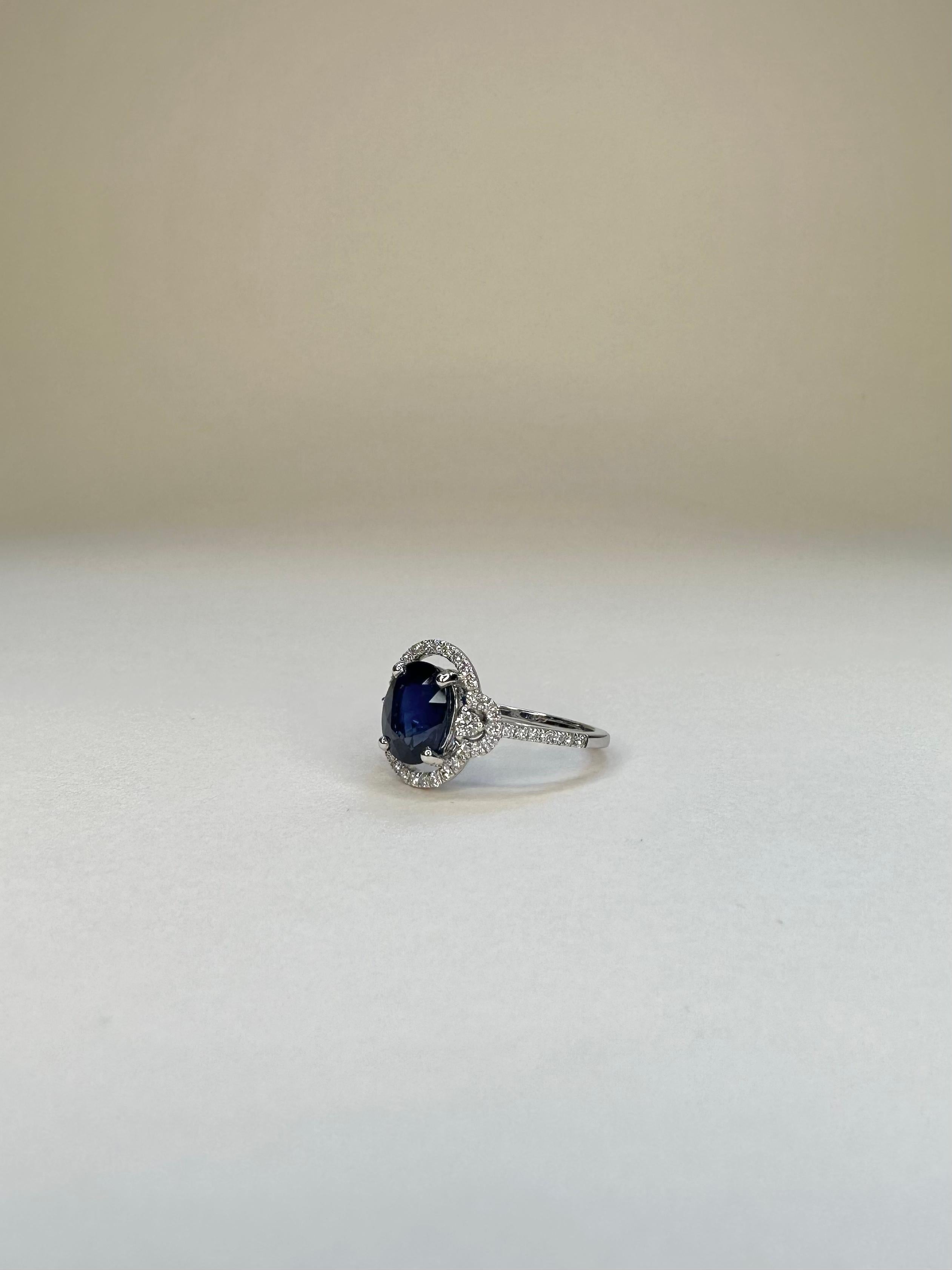 For Sale:  18k White Gold 3.08 Carat Royal Blue Oval Sapphire Ring 0.46 Cts of Diamonds 4