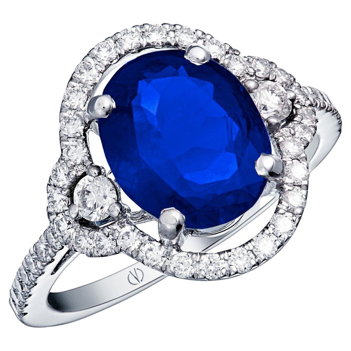 18k White Gold 3.08 Carat Royal Blue Oval Sapphire Ring 0.46 Cts of Diamonds