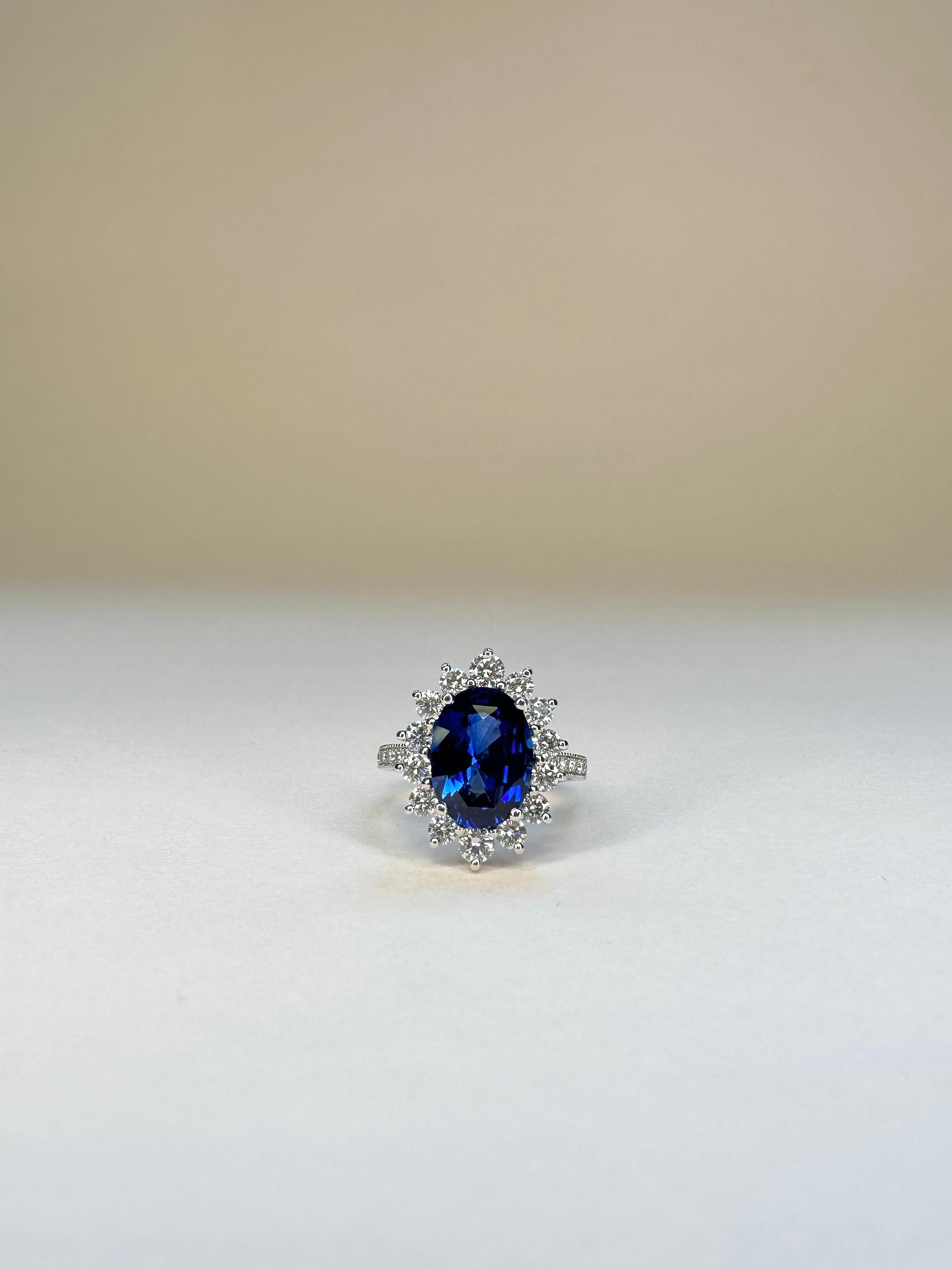 For Sale:  18k White Gold 3.99 Carat Royal Blue Oval Sapphire Ring With 1 Cts of Diamonds 4
