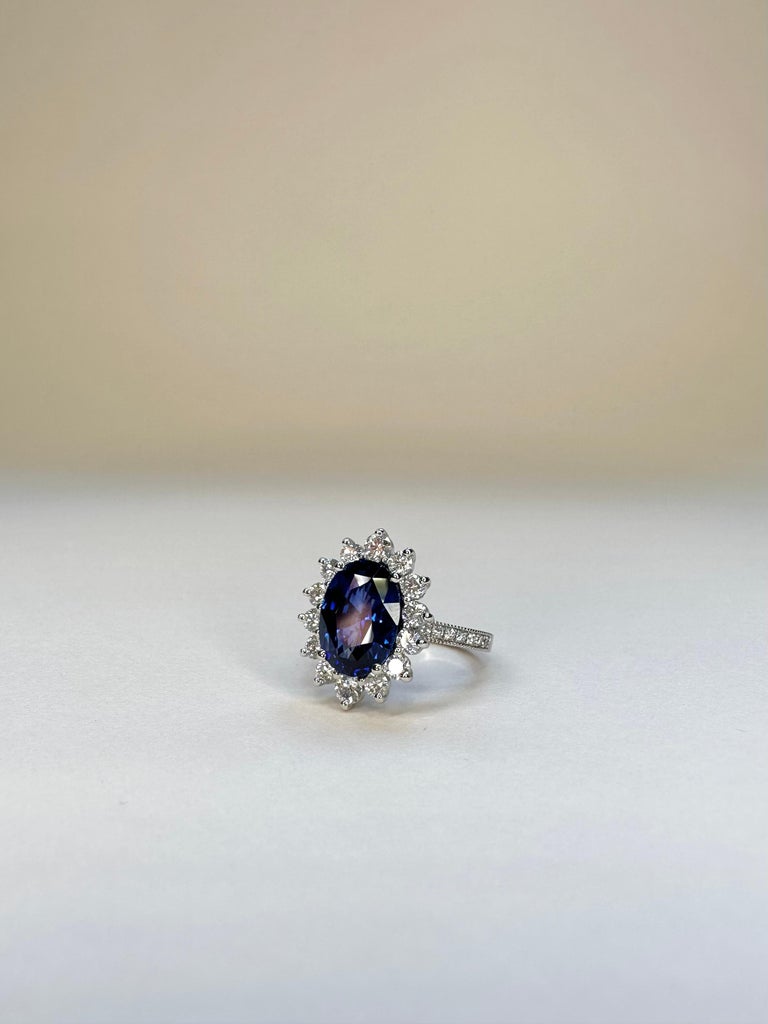 For Sale:  18k White Gold 3.99 Carat Royal Blue Oval Sapphire Ring With 1 Cts of Diamonds 5