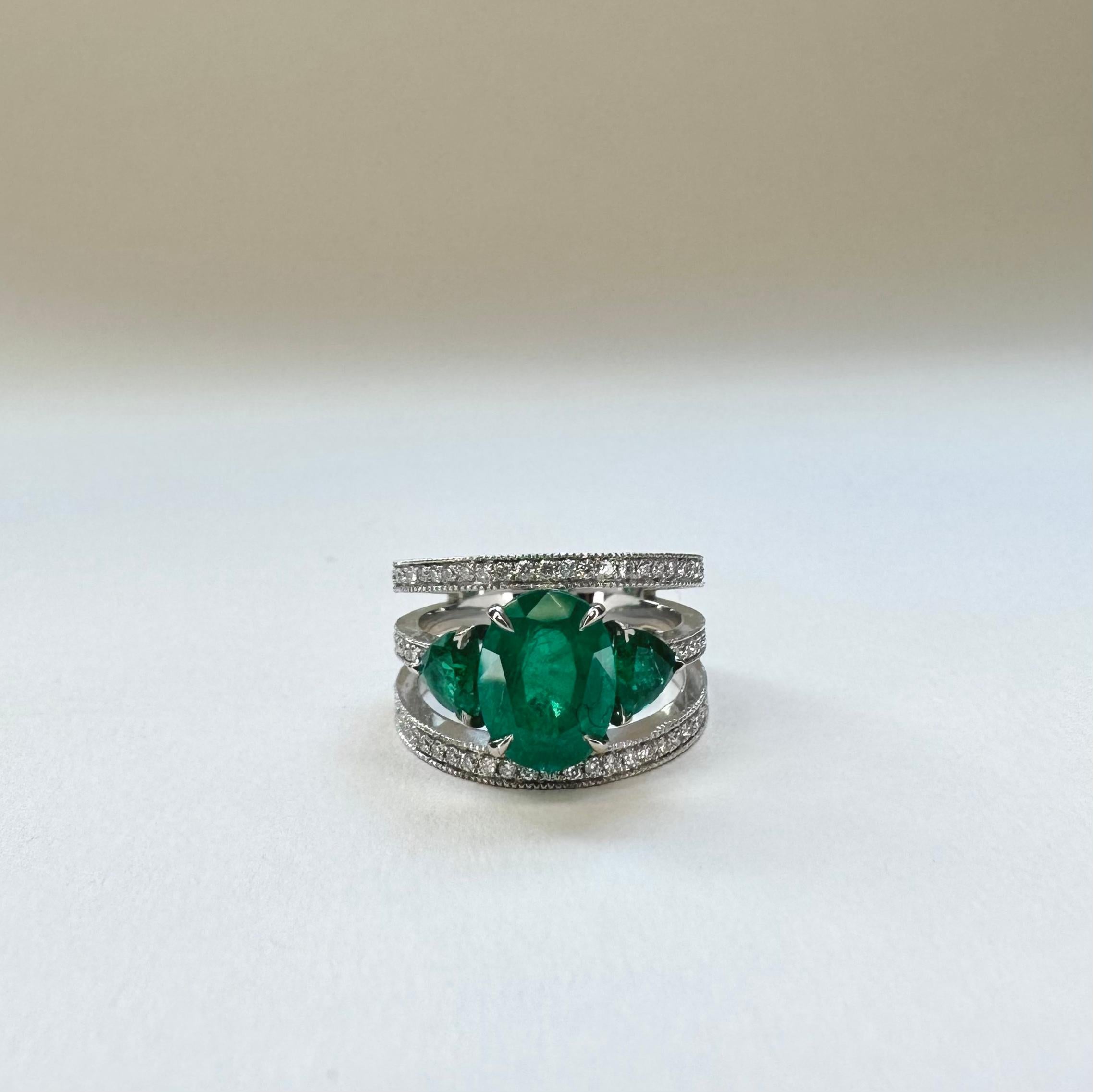 For Sale:  18k White Gold 2.51 Ct Vivid Green Oval Emerald Band Ring, 2 Troidia Emeralds 3