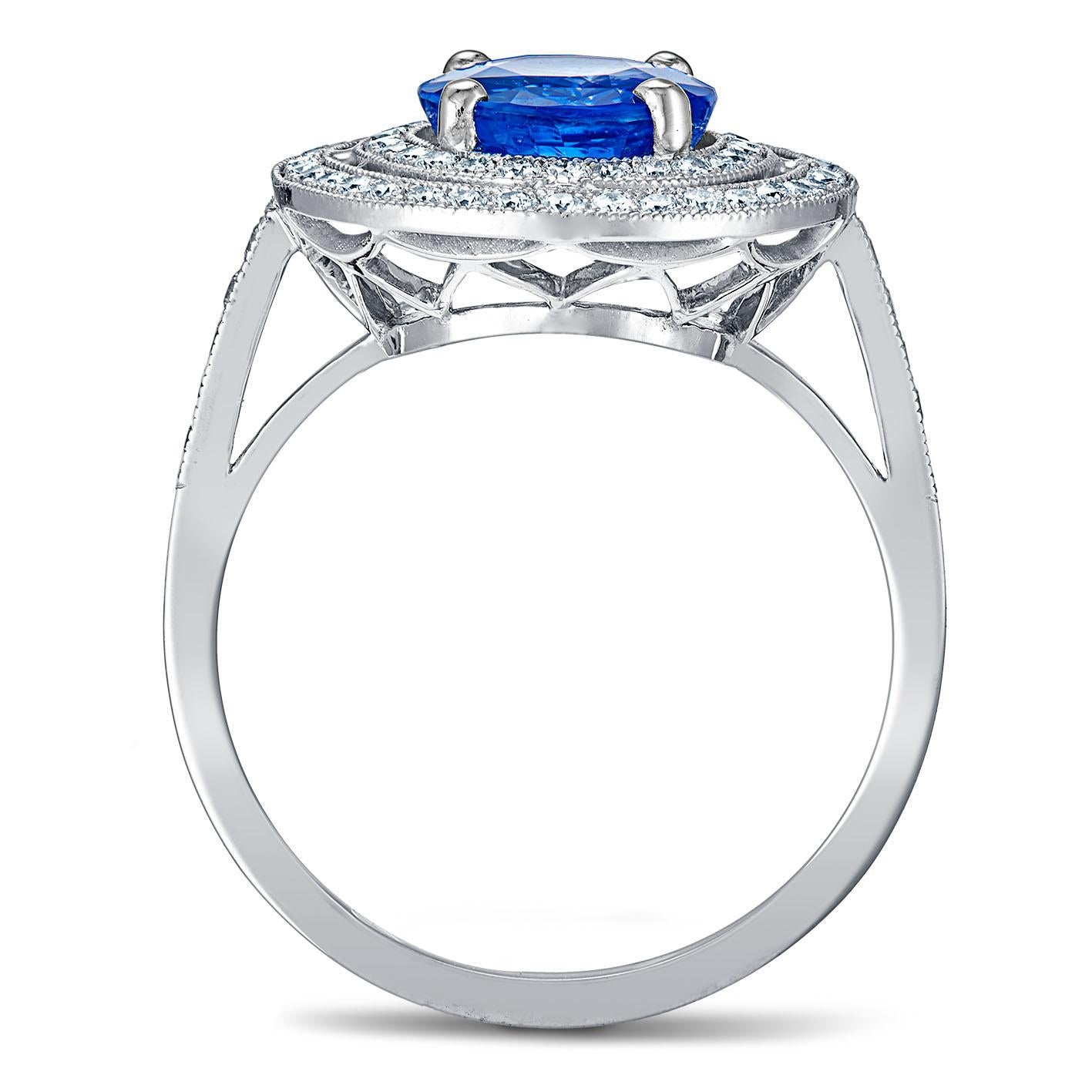 For Sale:  18k White Gold 2.74 Ct Royal Blue Oval Sapphire Ring With Two Rows of Diamonds 2