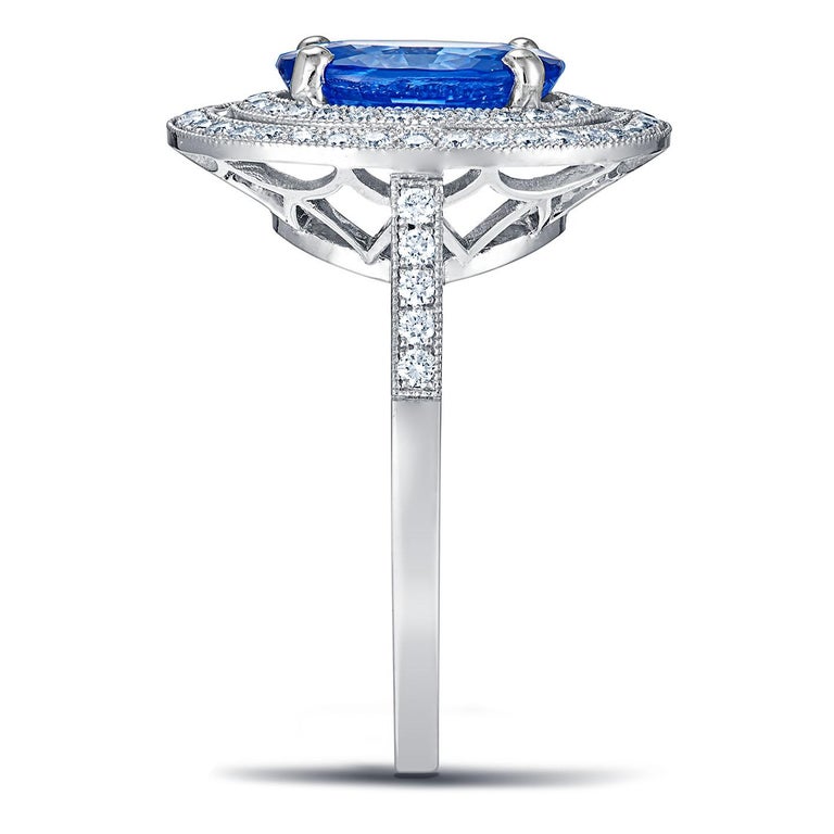 For Sale:  18k White Gold 2.74 Ct Royal Blue Oval Sapphire Ring With Two Rows of Diamonds 3