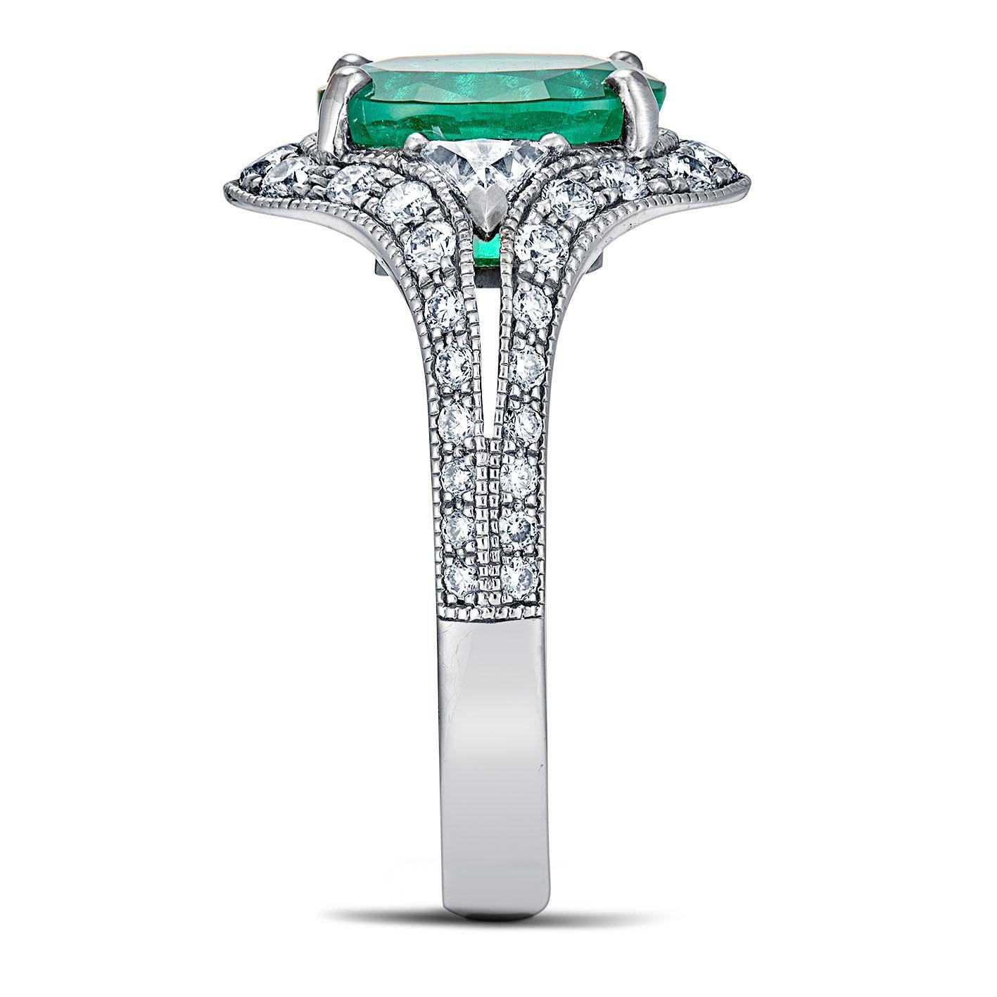 For Sale:  18k White Gold 2.53 Ct Oval Vivid Green Emerald Ring 0.74 Cts of Diamonds 2