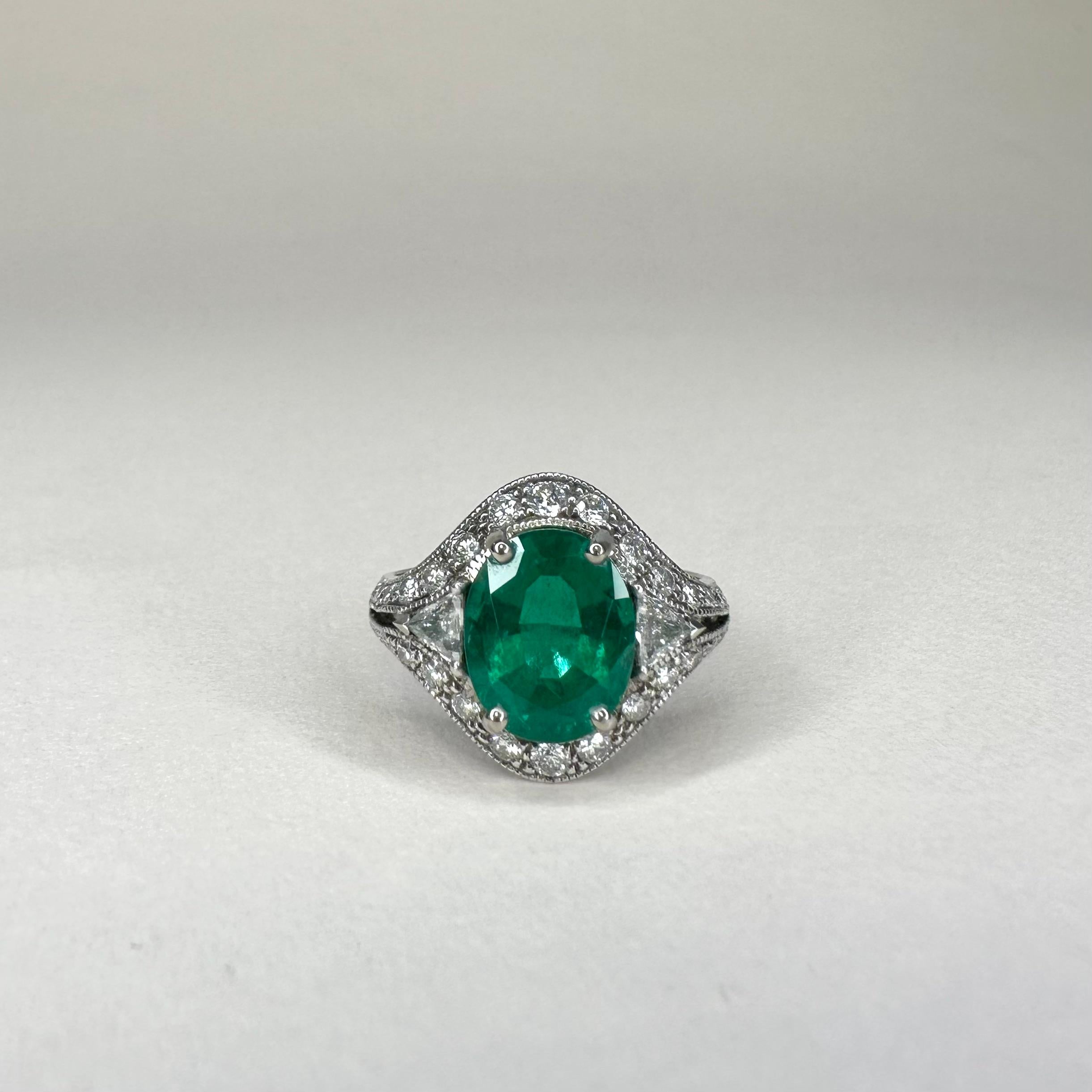 For Sale:  18k White Gold 2.53 Ct Oval Vivid Green Emerald Ring 0.74 Cts of Diamonds 3
