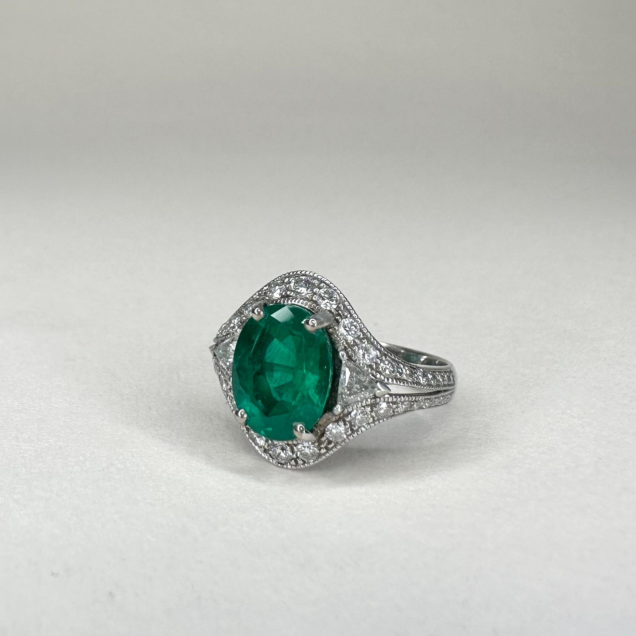 For Sale:  18k White Gold 2.53 Ct Oval Vivid Green Emerald Ring 0.74 Cts of Diamonds 4