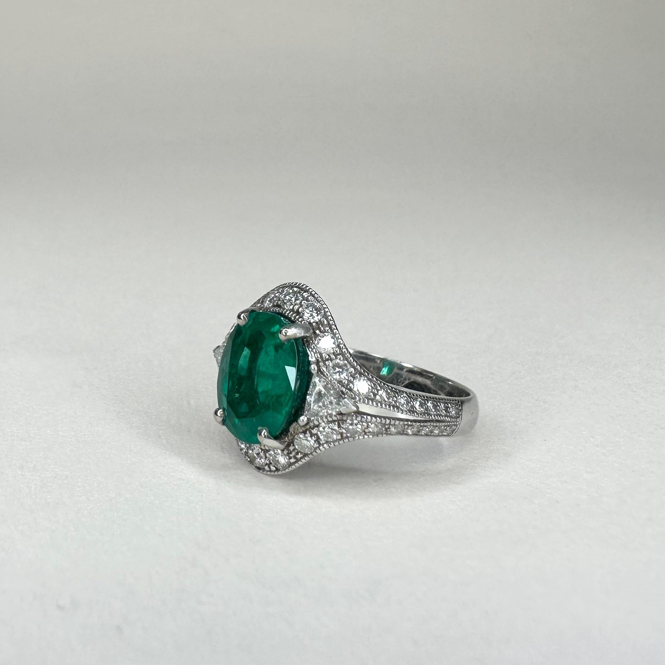 For Sale:  18k White Gold 2.53 Ct Oval Vivid Green Emerald Ring 0.74 Cts of Diamonds 5