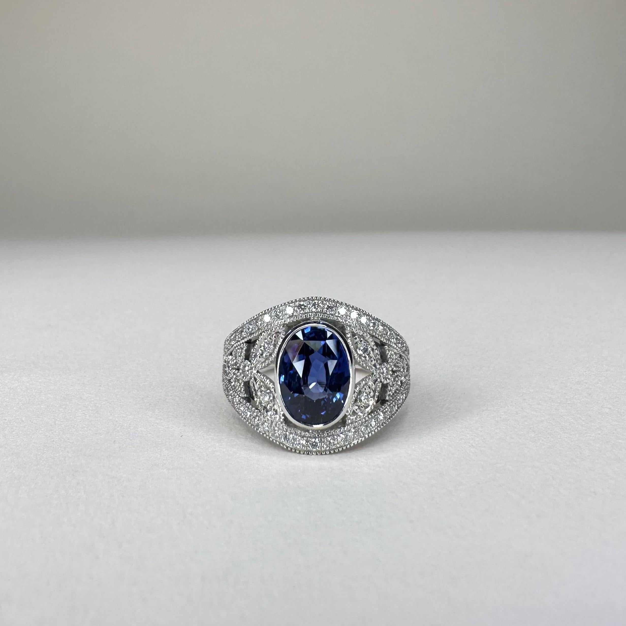 For Sale:  18k White Gold Band Ring 3 Ct Royal Blue Oval Sapphire and 0.60 Cts of Diamonds 2