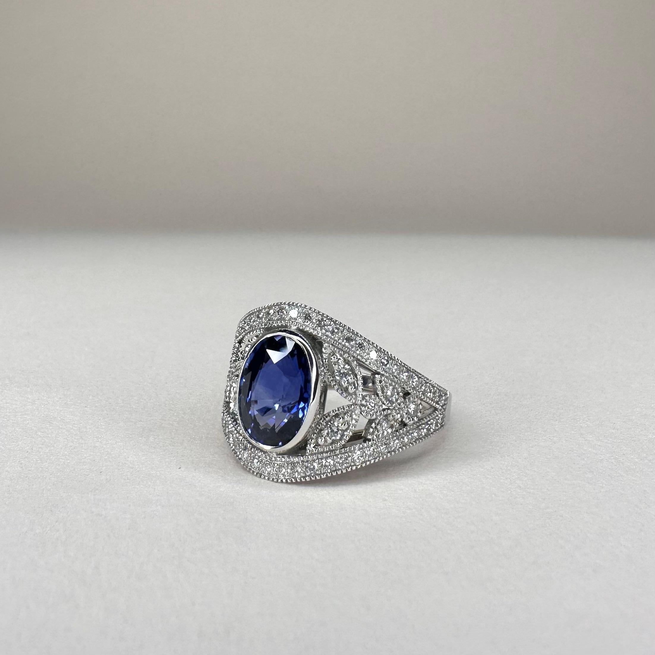 For Sale:  18k White Gold Band Ring 3 Ct Royal Blue Oval Sapphire and 0.60 Cts of Diamonds 3
