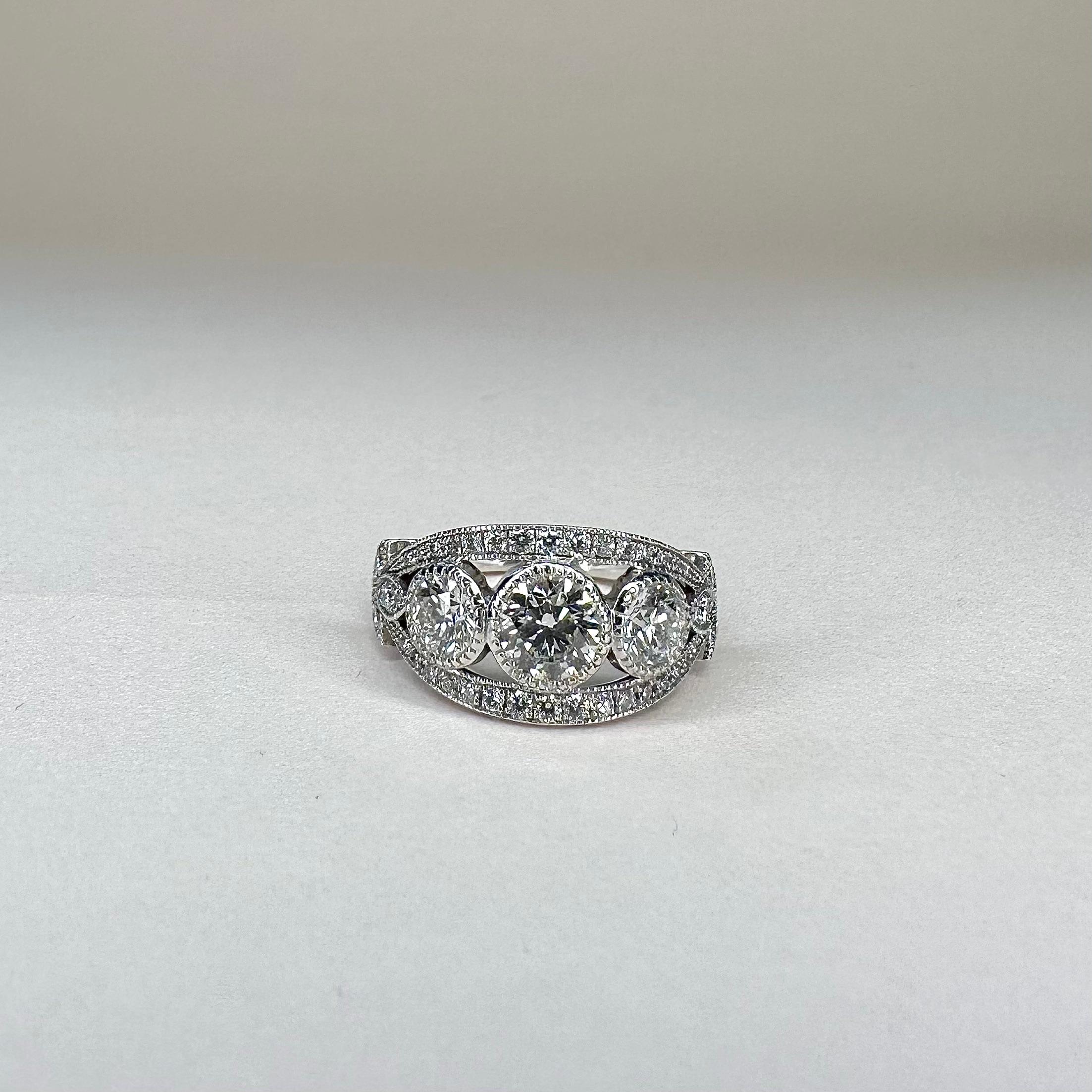 For Sale:  18k White Gold 3 Stone Diamond Ring With a 0.70 Ct And 2x 0.35 Cts Brilliant Cut 2