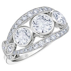 Bague en or blanc 18 carats avec 3 diamants de 0,70 carat et 2 diamants de 0,35 carat de taille brillant