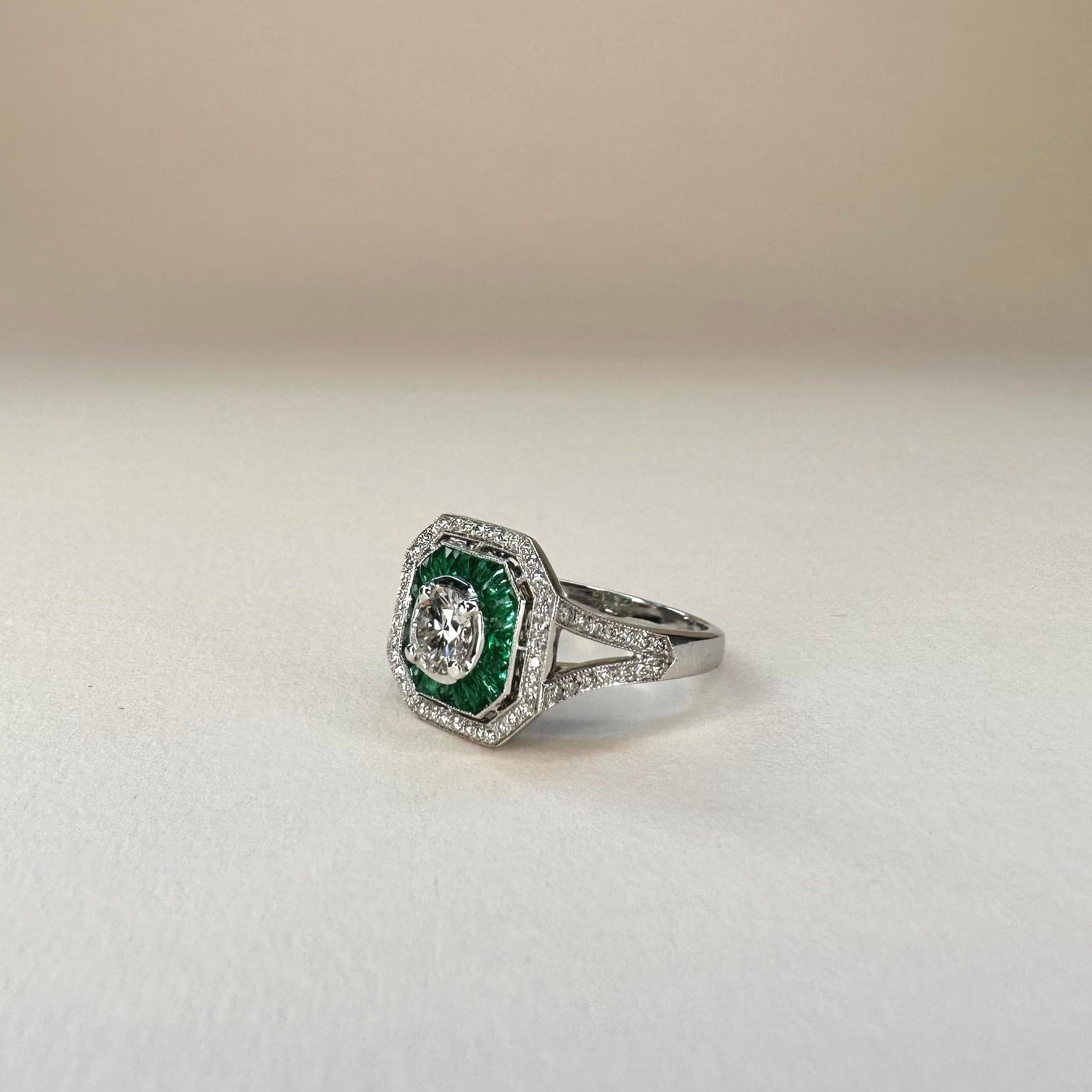 For Sale:  Platinum 0.30 Ct Vivid Green Calibre Cut Emerald with center 0.4 Ct Diamond Ring 6