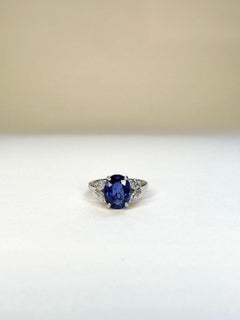 18k White Gold 2.83 Ct Royal Blue Oval Sapphire Ring Set With 4 Marquise Diamond