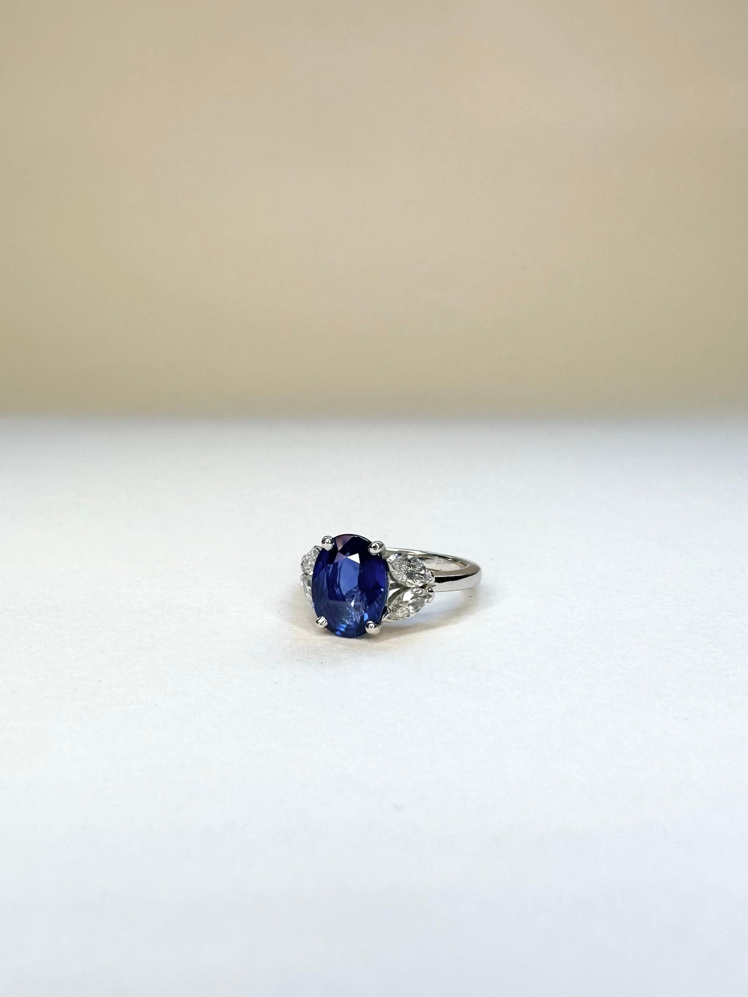 For Sale:  18k White Gold 2.83 Ct Royal Blue Oval Sapphire Ring Set With 4 Marquise Diamond 3