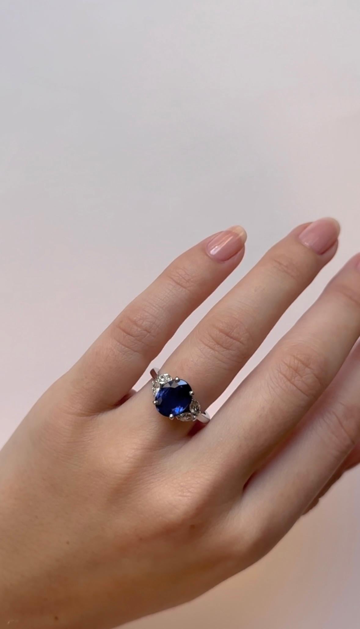 For Sale:  18k White Gold 2.83 Ct Royal Blue Oval Sapphire Ring Set With 4 Marquise Diamond 5