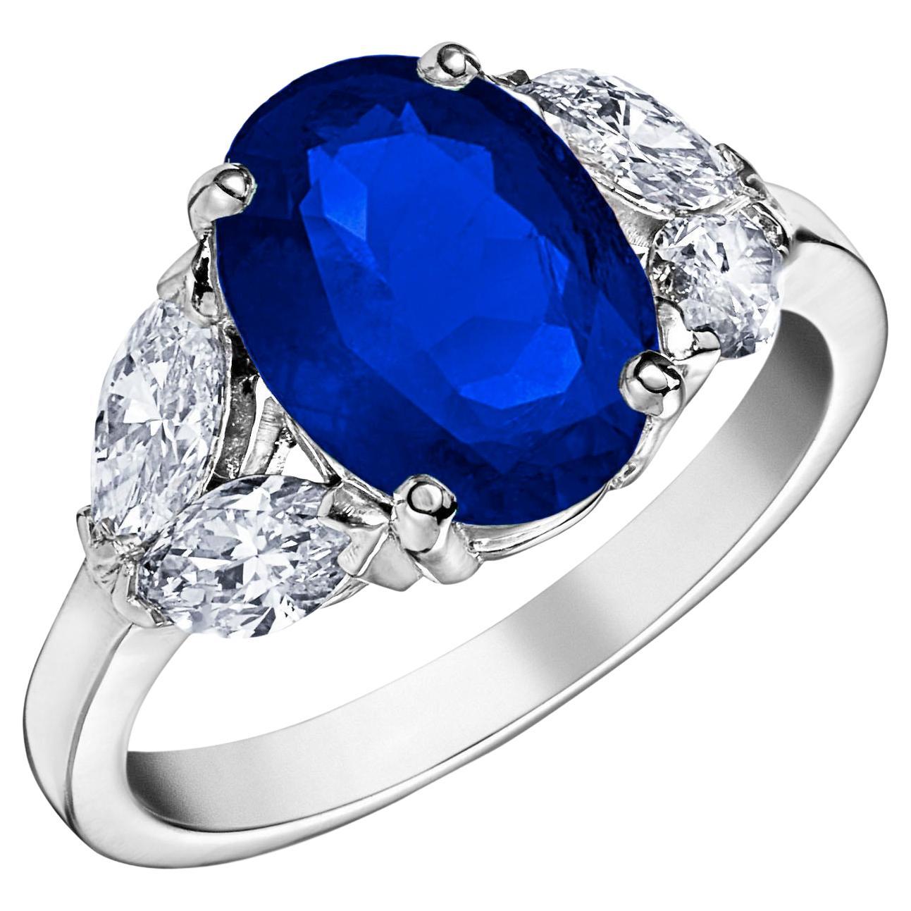 Anillo de oro blanco de 18 quilates con zafiro ovalado azul real de 2,83 quilates y 4 diamantes marquesa