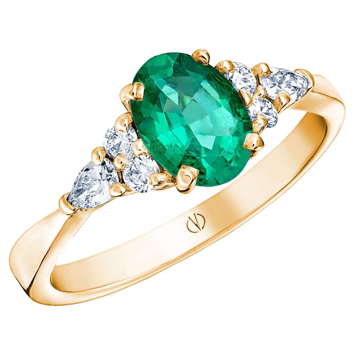 18k Yellow Gold 1, 18 Ct Oval Vivid Green Emerald and 0.28 Cts of Diamonds Ring