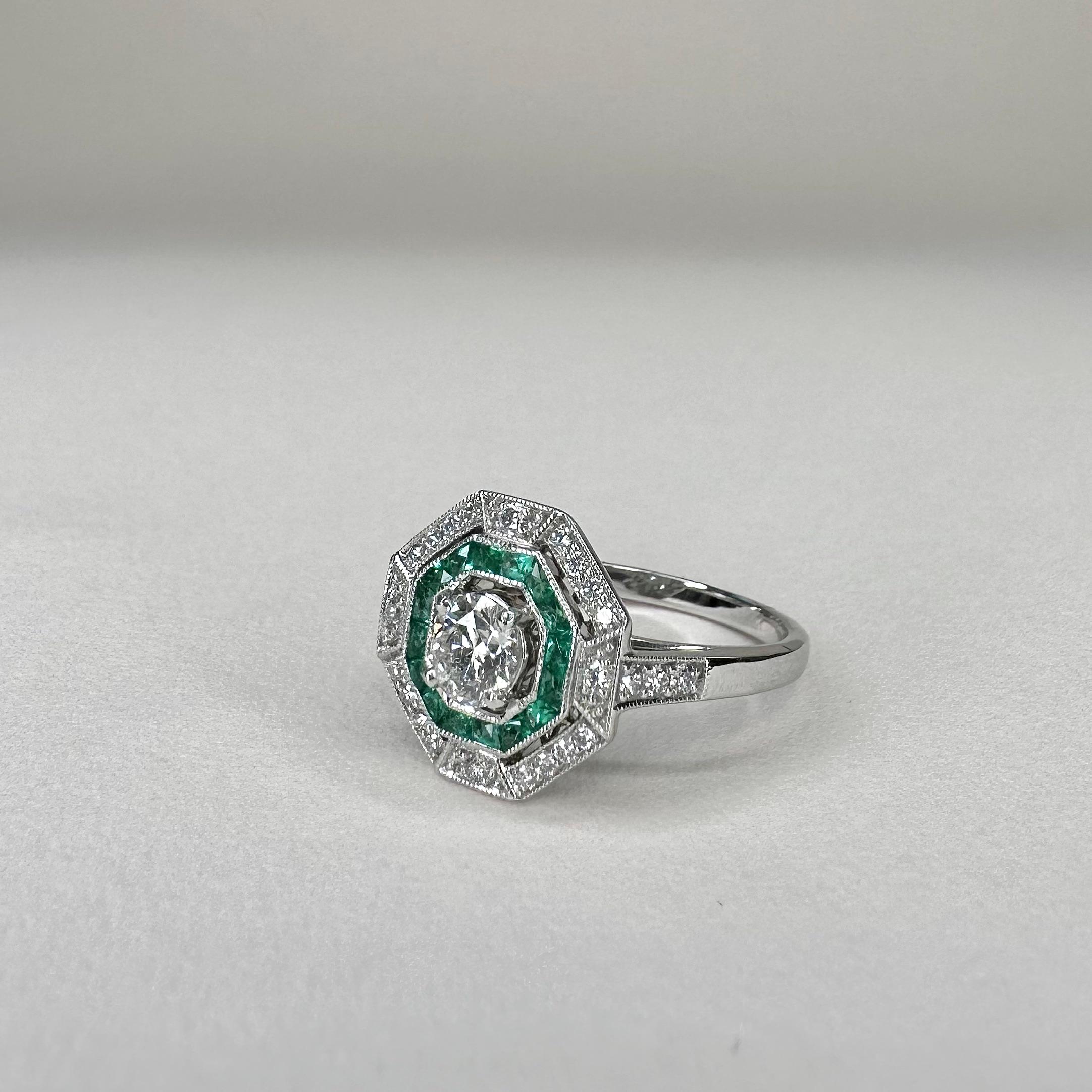 For Sale:  Art Deco Platinum Calibre Cut 0.25 Cts Emeralds and 0.4 Ct Diamond GIA Certified 5