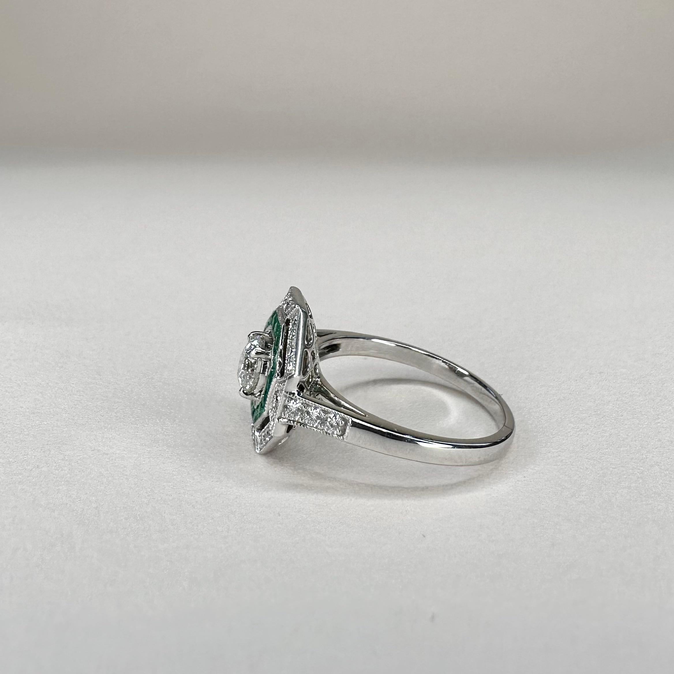 For Sale:  Art Deco Platinum Calibre Cut 0.25 Cts Emeralds and 0.4 Ct Diamond GIA Certified 6
