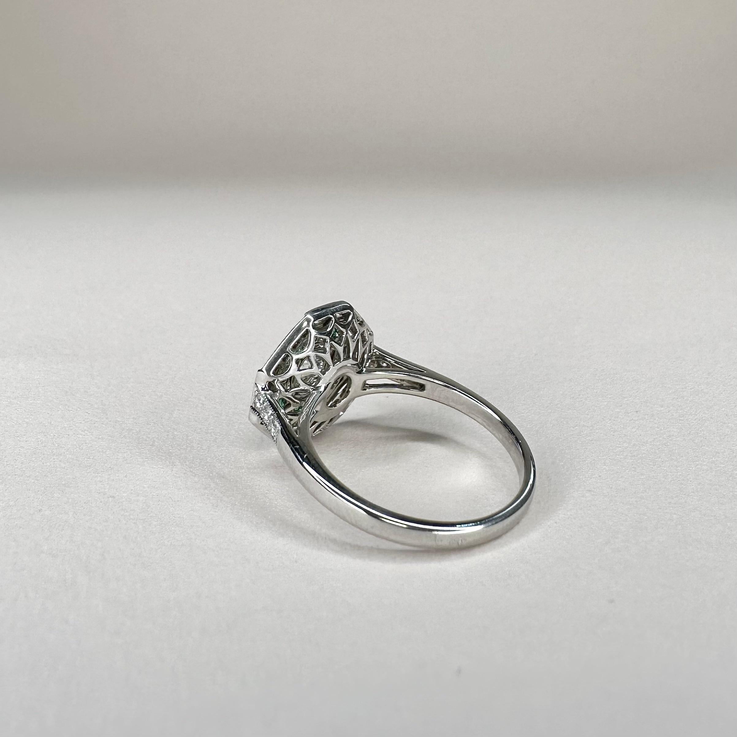 For Sale:  Art Deco Platinum Calibre Cut 0.25 Cts Emeralds and 0.4 Ct Diamond GIA Certified 7