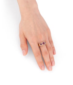 Bague jarretière ancienne en or, diamants et rubis