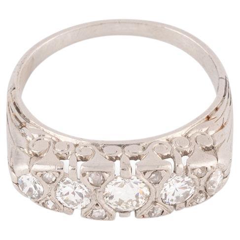 Ancient Bague jarretière en platine et diamants