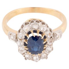 Bague Marguerite ancienne en saphir et diamants