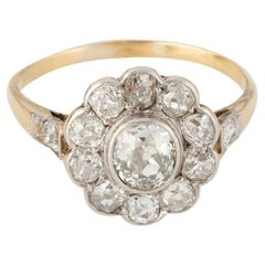 Bagues marguerite du début du 20ème siècle en or 18 carats et diamants