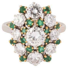 Bagues marguerite vintage diamants et émeraudes