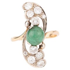 Bague marquise vintage en émeraude et diamants