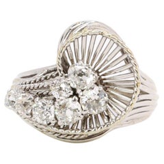 Vintage Bague tourbillon en or blanc et diamants 1 ct