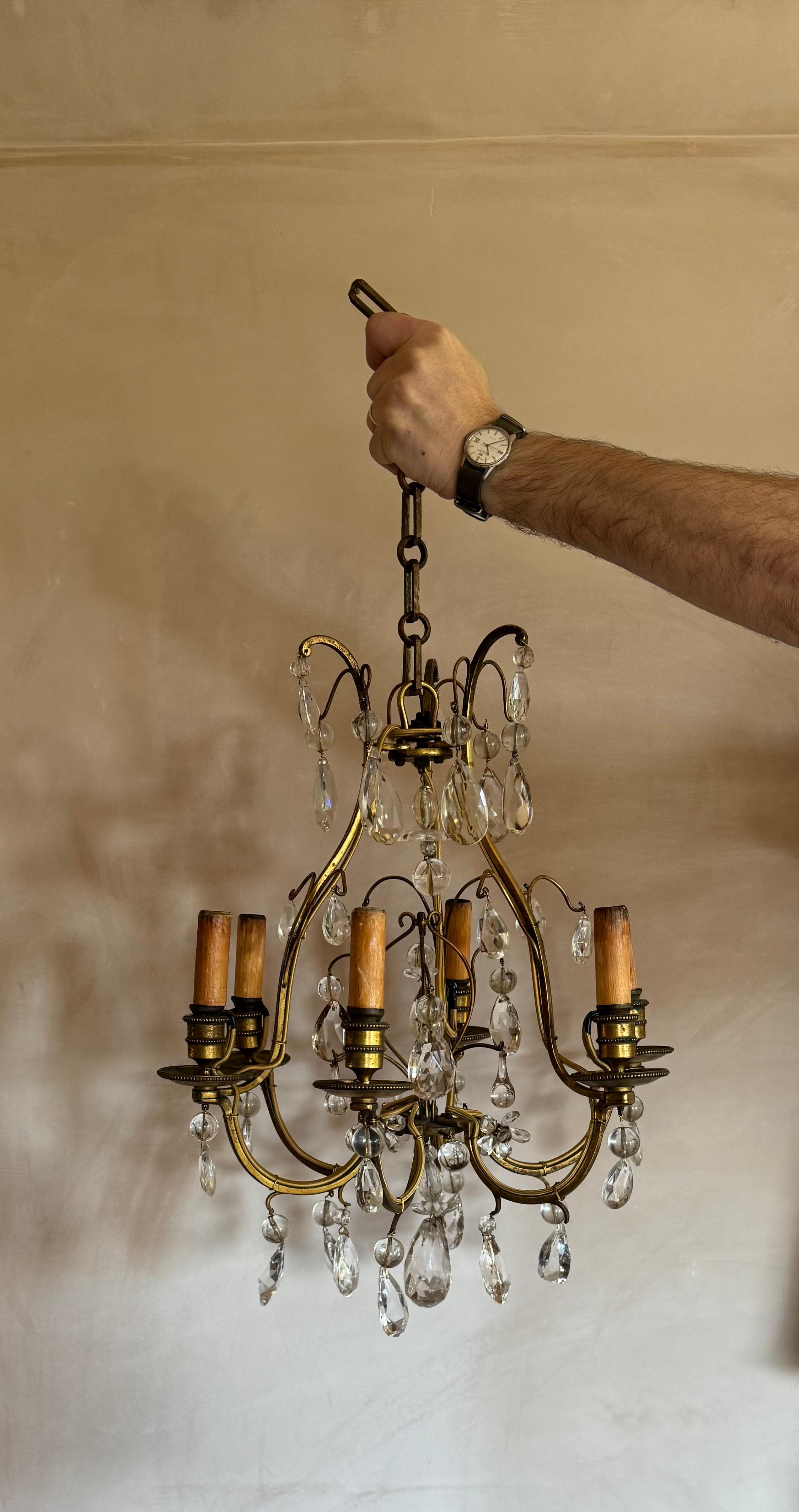 Araña de hierro dorado y cristal Bagues stylé siglo XX en venta